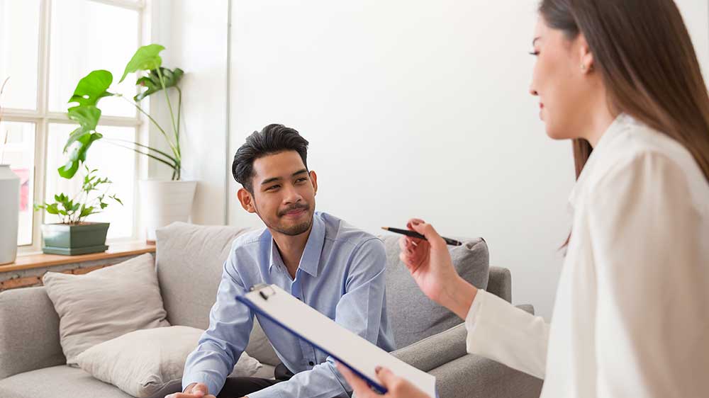 Doctor talking to a man